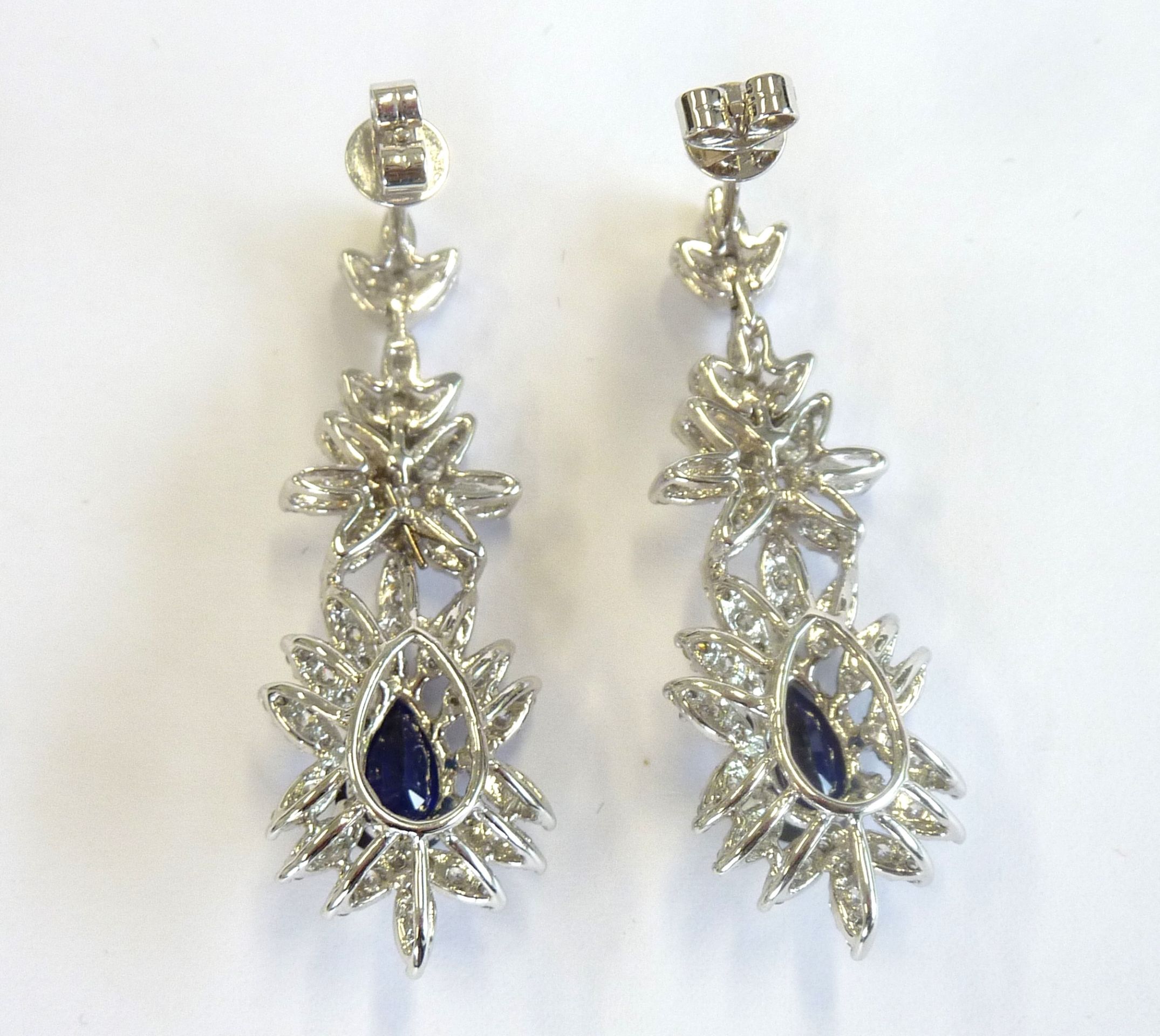 A pair of sapphire and diamond earrings (matching lot 334)