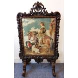 A very fine mid-19th century carved rosewood fire-screen;