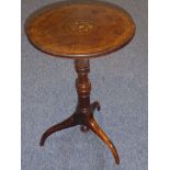 A late-19th Century circular-topped rosewood occasional table;