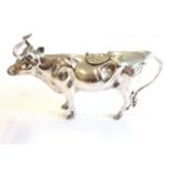 A rare early-20th century hallmarked silver cow creamer; maker's mark for Berthold Muller,