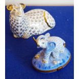 A Royal Crown Derby paperweight modelled as a recumbent ram ('gold button'),