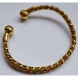 ONLY TWO PLAITS A Continental yellow gold (marked 750) three-row plaited bracelet (slight damage),