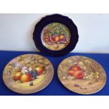 Three cabinet plates, one Royal Worcester decorated with a still life of peaches and grapes etc.