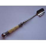 ADDED LOT A late 19th Century silver plated stilton scoop with carved ivory handle modelled as a