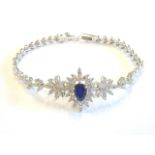 An 18-carat white gold bracelet set with sapphire and diamonds (matching lot 335)