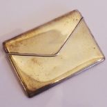 A hallmarked silver card case in the form of an envelope, 10cm wide,