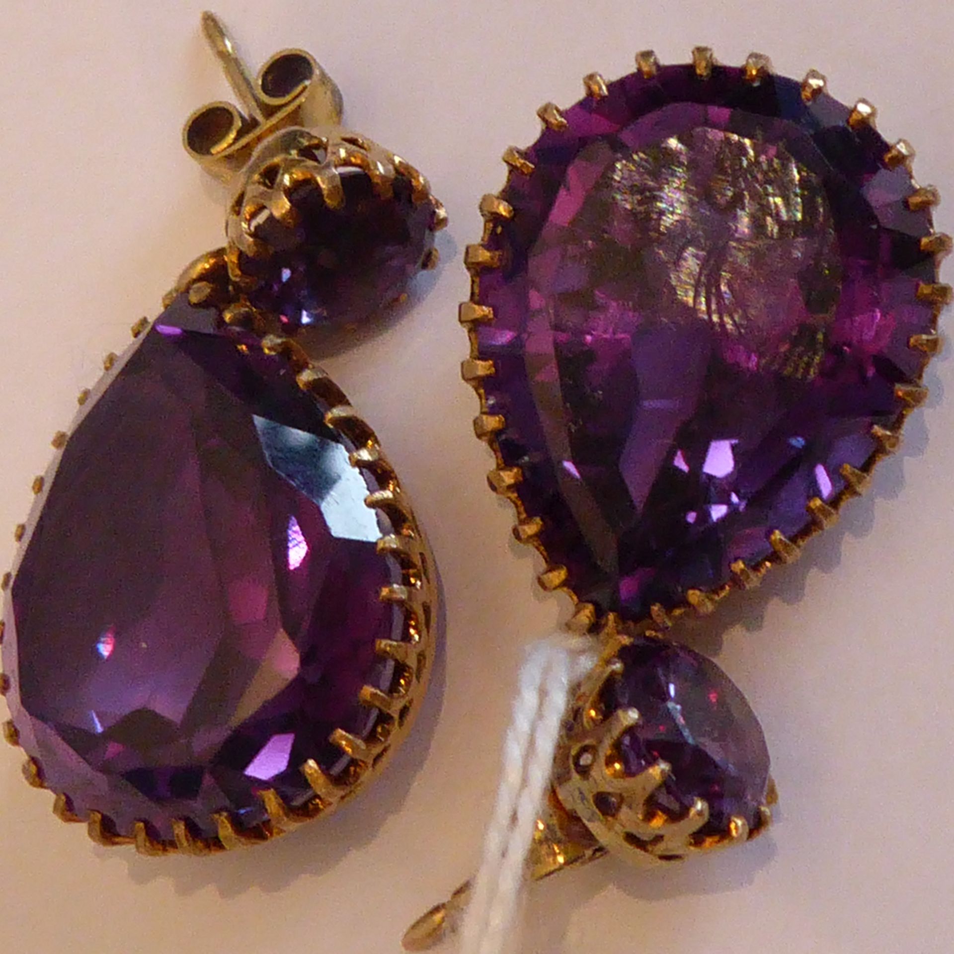 A pair of yellow metal drop earrings set with large pear-shaped hand-cut amethysts - Image 11 of 11