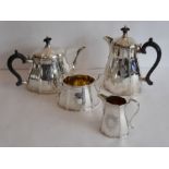 A fine heavy-gauge four-piece tea service comprising teapot, hot-water jug, two-handled sugar and