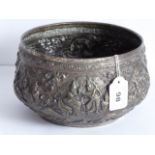 An early-/mid-20th century Thai (Siamese) bowl of circular form decorated typically in relief with