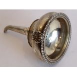 A George III period hallmarked silver two-part wine funnel gadrooned edge, pierced bowl and with