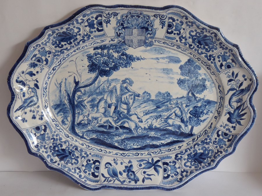 A 19th century Continental Faience platter of oval form with scallop edges, hand decorated with an - Image 2 of 2