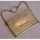 A hallmarked silver Aide-Memoire case in the form of a handbag with chain handle, maker's mark W.H.