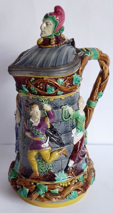 A 19th century Minton Majolica lidded pottery jug; the hinged scallop-shell-shaped cover