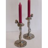 A pair of Art Nouveau-style figural candlesticks signed to the base 'Rubin' (modern)