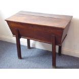 A George III period elm dough bin on moulded square legs (94cm wide)