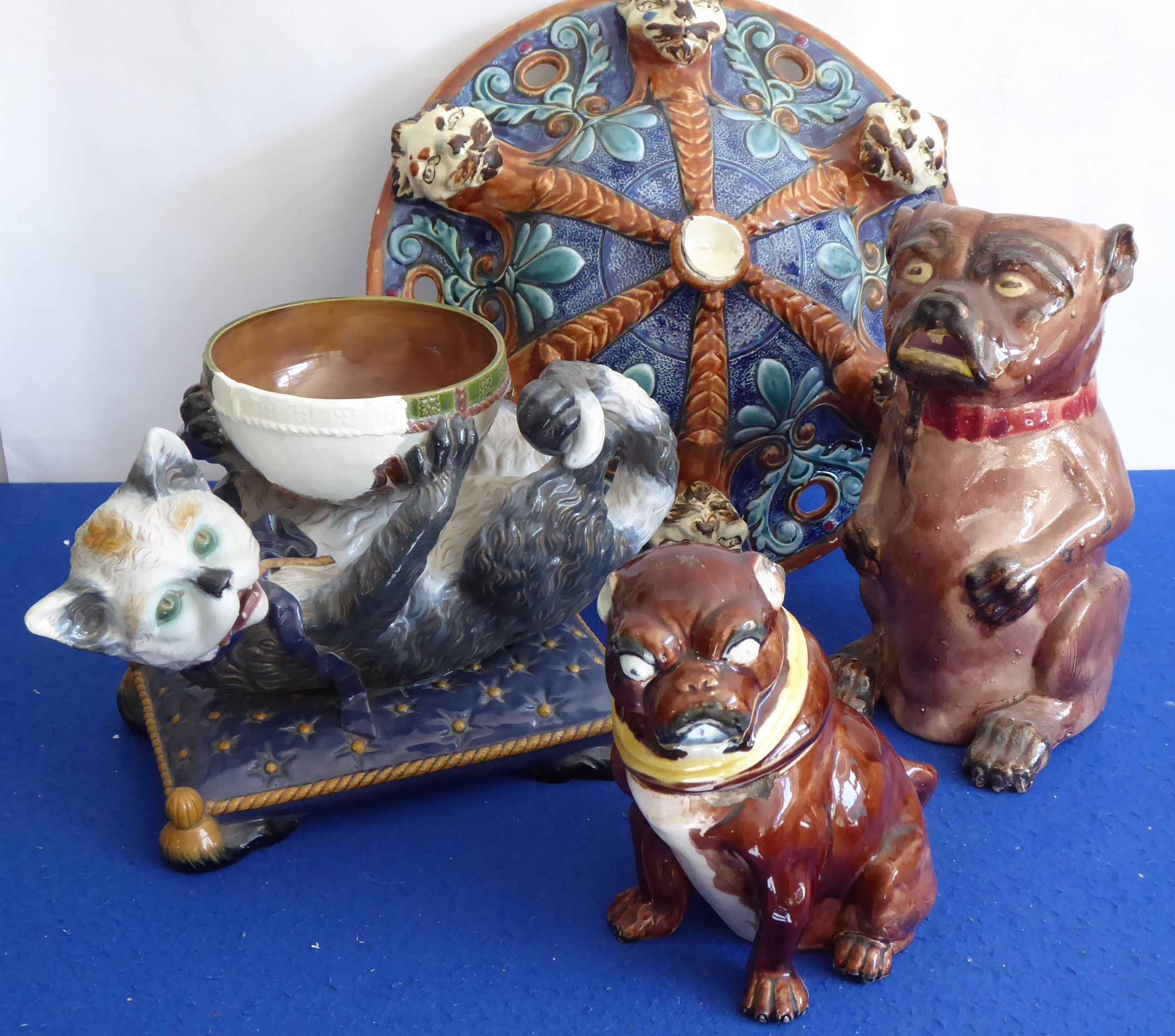 A selection of mostly damaged 19th century Majolica to include a stand, the border decorated in