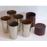 An early-20th century set of five silver-plated concentric beakers of tapering form within a hand-