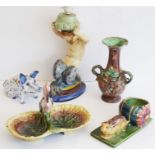 A small selection of mostly damaged 19th century Majolica pottery to include a Merman (broken and