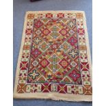 An unusual early-20th century hand-knotted thick-pile Eastern style rug produced in two halves and