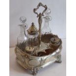 A hallmarked silver seven-division cruet stand, maker's mark JE, assayed London 1859, together