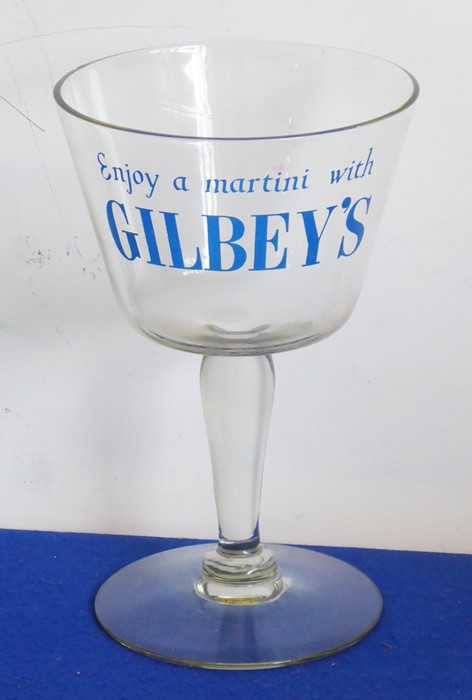 An oversized mid-20th century advertising drinking glass, 'Enjoy a martini With Gilbey's' (18.25cm