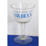 An oversized mid-20th century advertising drinking glass, 'Enjoy a martini With Gilbey's' (18.25cm