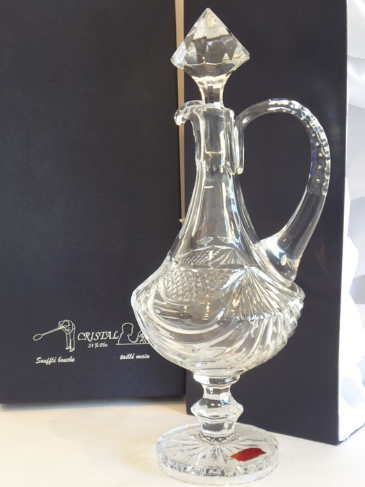 A boxed lead-crystal wine jug and stopper