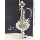 A boxed lead-crystal wine jug and stopper