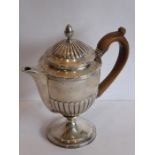 A hallmarked silver Argyle-style hot-water jug domed lobed cover surmounted with an acorn-style