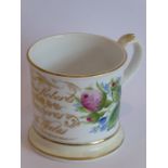 A Welsh pottery 18th century Christening mug with painted flowers and gilt inscription 'Kyffin