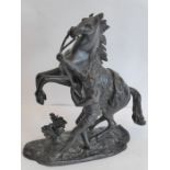 After Guillaume Coustou the Elder (1677-1746), a 19th century patinated bronze sculpture of a Marley