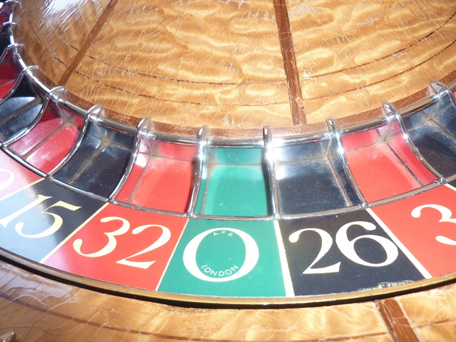 A rare and large late 19th/early 20th century American saloon roulette wheel marked for THE GEO. - Image 5 of 13