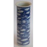 A late 19th century Chinese porcelain sleeve vase in Kangxi style hand decorated in underglaze