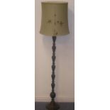 A mid-20th century Chinese bronze lamp standard; raised on slightly spreading circular foot, the