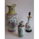 Three Chinese porcelain vases, 20th century, one of rouleau form painted in a famille-verte