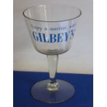 A circa 1950s oversized novelty advertising drinking glass: 'Enjoy a martini with GILBEY'S' (very