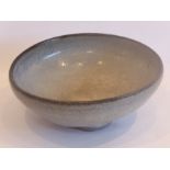 An unusual bowl, Song or later, of large size; both interior and exterior in a flocculated milky,
