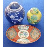 An Oriental ceramic group comprising a Chinese porcelain ginger jar and cover in Kangxi style (