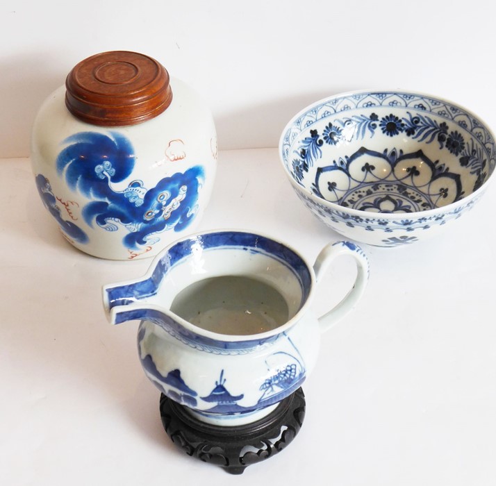 A blue and white bowl, 20th century, in late Ming style, painted with auspicious objects and borders