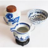 A blue and white bowl, 20th century, in late Ming style, painted with auspicious objects and borders