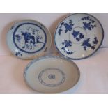 Three Chinese porcelain dishes (probably 18th century) decorated with floral sprigs, a mythical