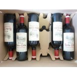 Eleven bottles of Château Rocher-Calon 2009 - Grand Vin de Bordeaux (12- bottle cardboard case