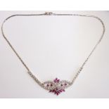 An 18-carat white-gold, ruby and diamond necklace