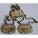 Three matching early/mid-19th century silver-coloured spirit tickets 'Brandy', 'Port' and '