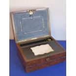 A good 19th century dome-topped walnut lap desk, hinged lid opening to reveal fitted interior with