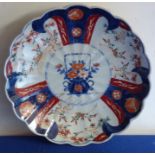 AMENDMENT - ITEM IS JAPANESE  A late 19th century Chinese porcelain charger of flower-head shape and