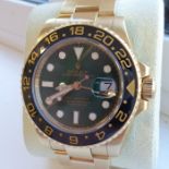 An 18-carat yellow-gold gentlemen's Rolex GMT-Master II wristwatch with unusual green dial signed: