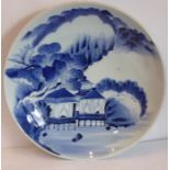 A late 19th/early 20th century Japanese porcelain dish decorated in underglazed blue with two