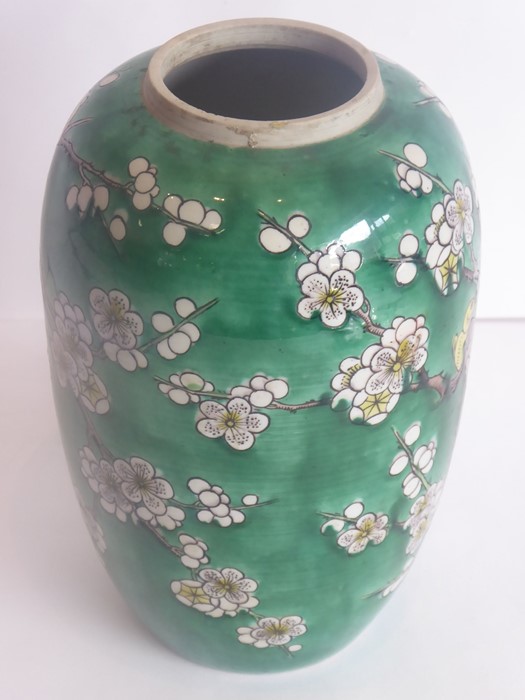 An early 20th century Japanese pottery vase decorated with birds amongst prunus blossom against a - Image 3 of 7