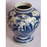 A late 19th century Chinese porcelain vase hand decorated in underglaze blue in Kangxi style with